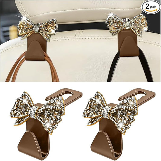 Zpana Bling Car Headreat Hook, 2PCS Crystal Rhinestone Cute Bow Vehicle Seat Back Hanger Storage for Purses Bags Grocery, Diamond Auto Rear Seat Organizer, Universal for SUV Truck Sedan (Gold)