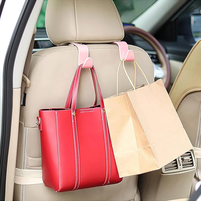 Osilly Car Seat Headrest Hook, 4 Pack Auto Seat Hanger Storage Organizer for Purse Handbag Coats Grocery Bags, Automotive Interior Accessories, Universal Vehicle Backseat Hanging Hook (Pink)