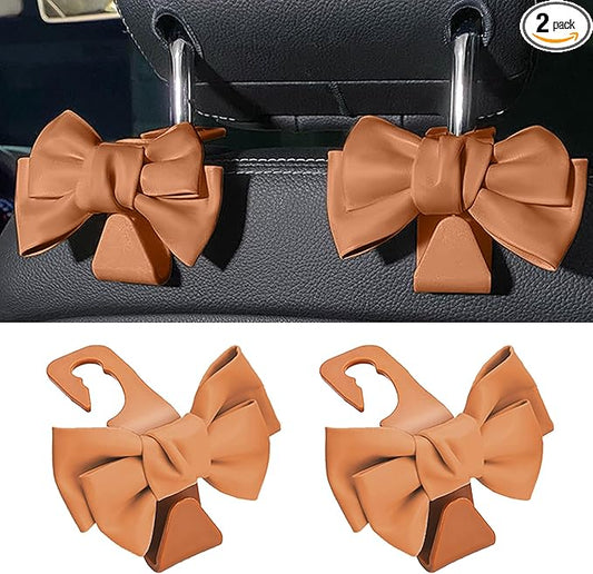2 PCS Car Seat Headrest Hooks, Cute Bow Shaped Vehicle Backseat Storage Hooks, Leather Bow Shaped Sturdy Car Seat Back Hook for Purses/Coats (Brown)