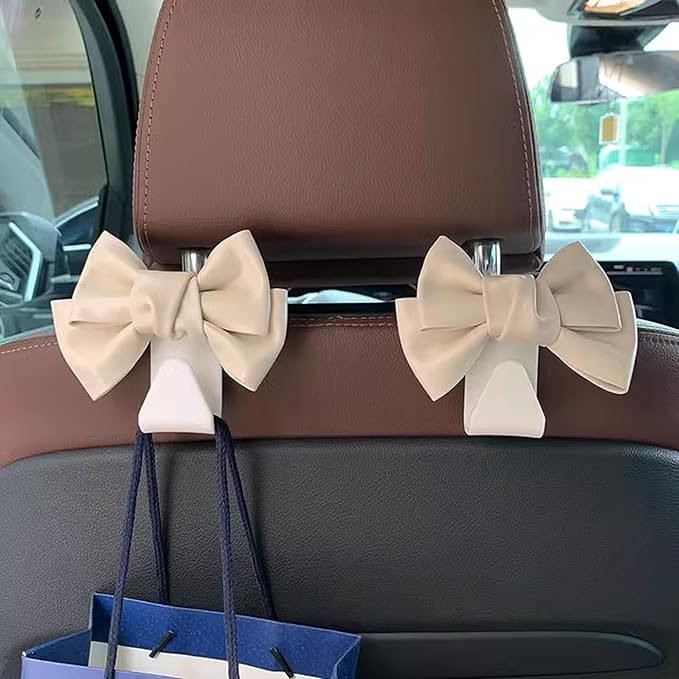 2 PCS Car Seat Headrest Hooks, Cute Bow Shaped Vehicle Backseat Storage Hooks, Leather Bow Shaped Sturdy Car Seat Back Hooks for Purses/Coats, Car Accessories (White)