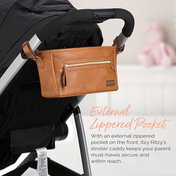 Itzy Ritzy Adjustable Stroller Caddy and Organizer Bag Featuring Front Zippered Pocket, 2 Built-in Interior Pockets & Adjustable Straps to Fit Nearly Any Stroller (Cognac)