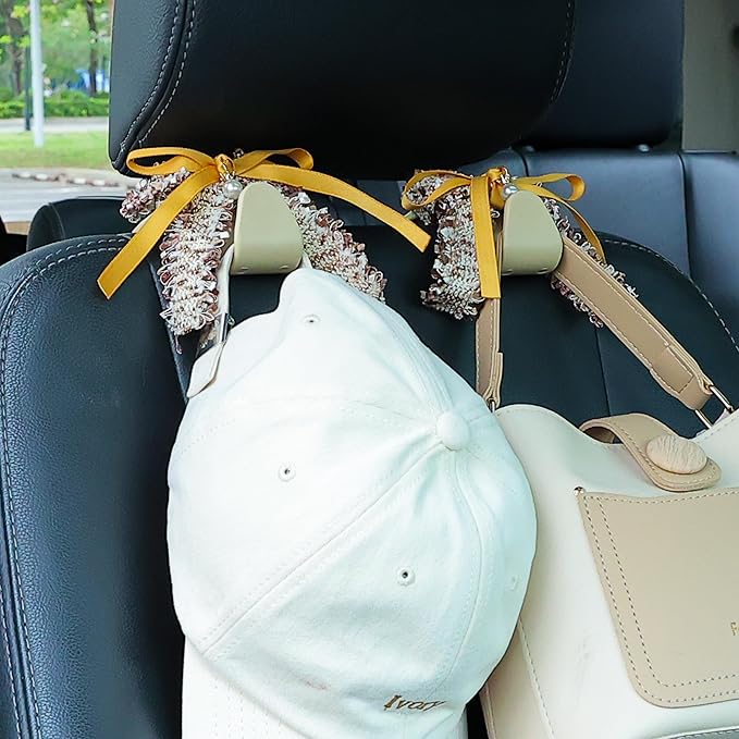 Amooca Car Seat Headrest Hook Cute Bowknot Vehicle Hanger Car Storage Organizer for Handbag Purse Coat Grocery Bag Beige Yellow