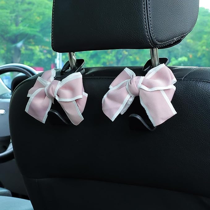Amooca Car Seat Headrest Hook Cute Bowknot Vehicle Hanger Car Storage Organizer for Handbag Purse Coat Grocery Bag Black Pink