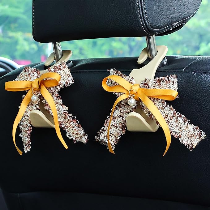 Amooca Car Seat Headrest Hook Cute Bowknot Vehicle Hanger Car Storage Organizer for Handbag Purse Coat Grocery Bag Beige Yellow